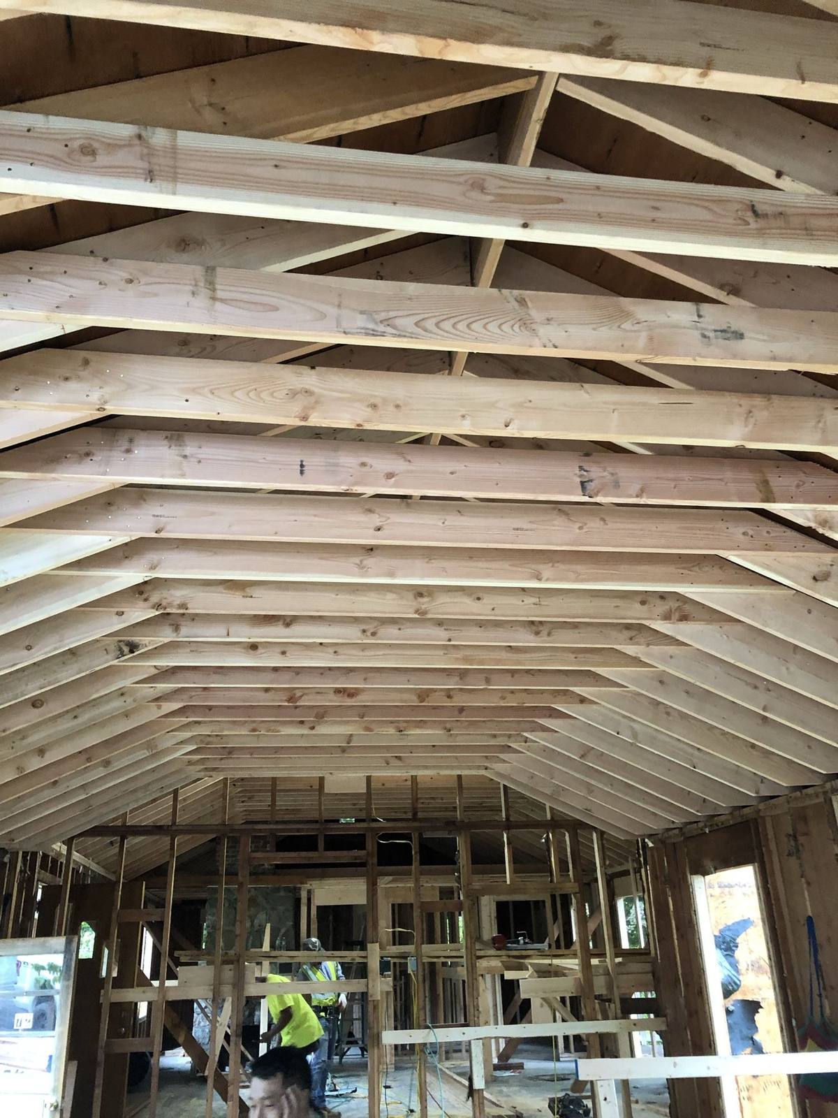 Interior vaulted ceiling with exposed wood roof trusses